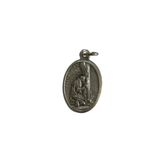 Silver St Mary Magdalene medal depicting the saint kneeling in penitence at the foot of a cross.