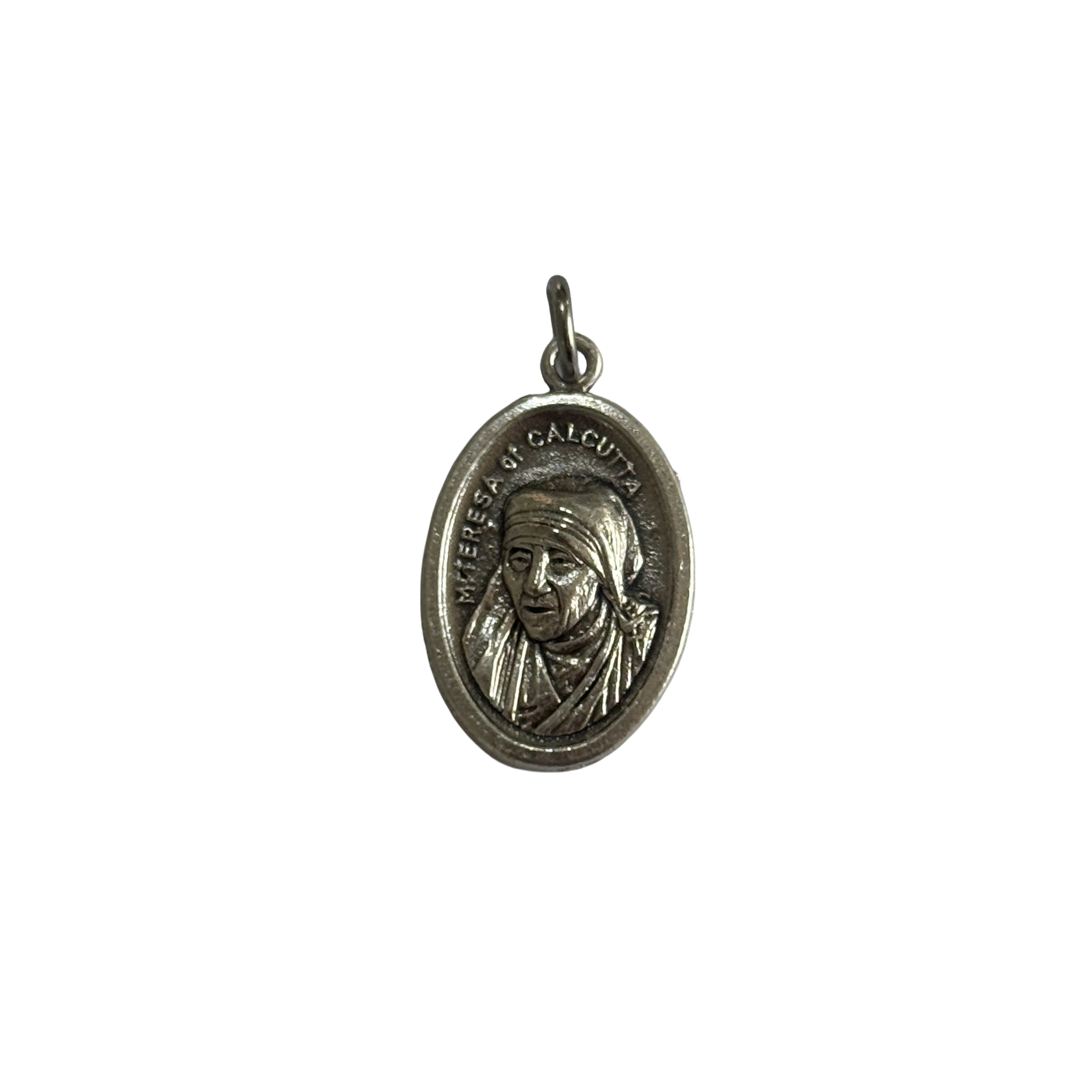 Silver St Mother Teresa medal showing a detailed bust relief of the saint wearing her traditional habit.