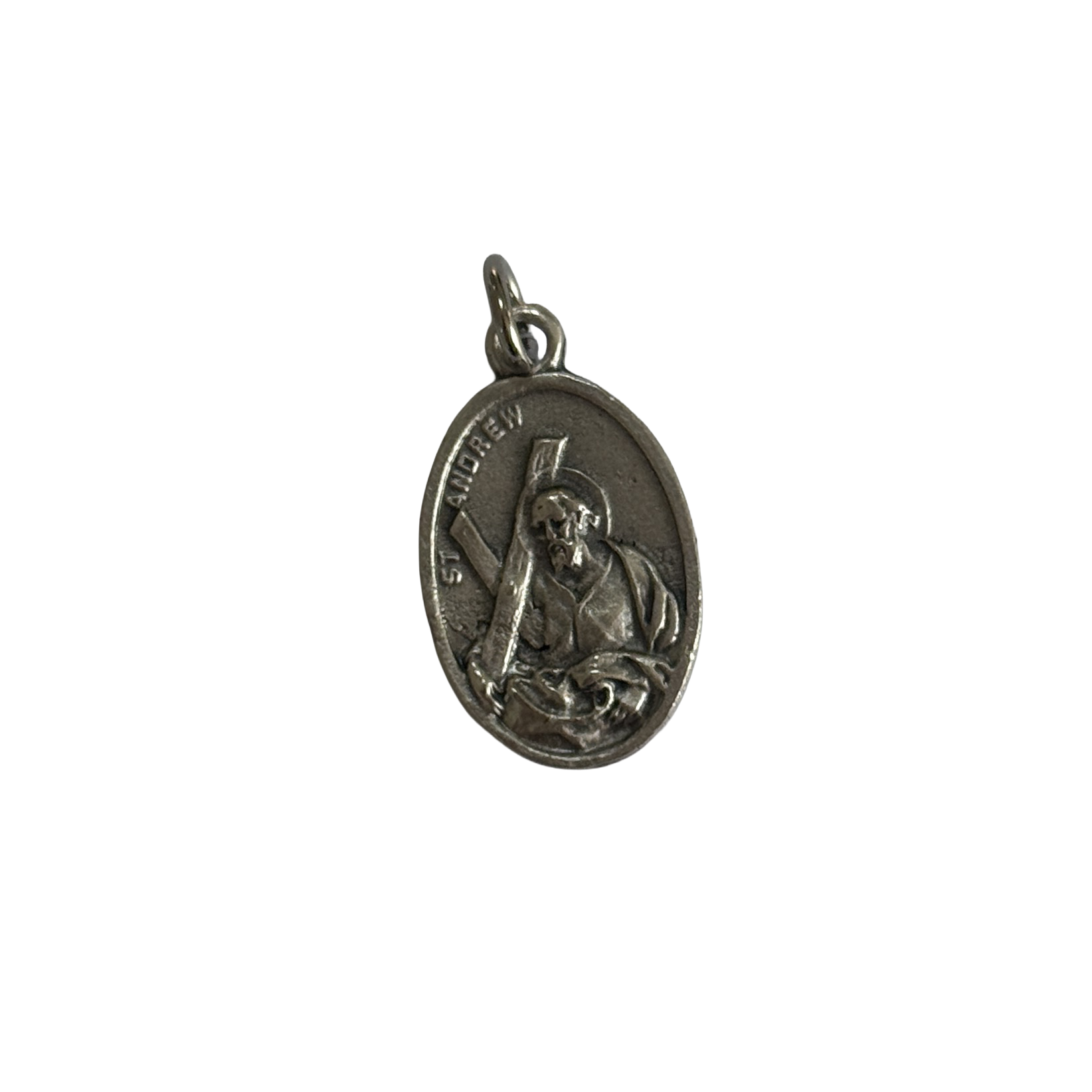 Silver St Andrew medal depicting the apostle leaning against a large X-shaped saltire cross.