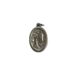 Reverse side of a silver St Bernadette medal depicting the apparition of Our Lady of Lourdes in the grotto.