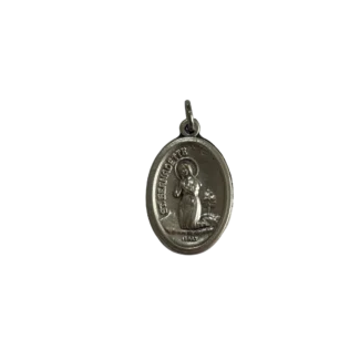 Silver St Bernadette medal showing the saint kneeling in prayer with a halo and Italy stamp.