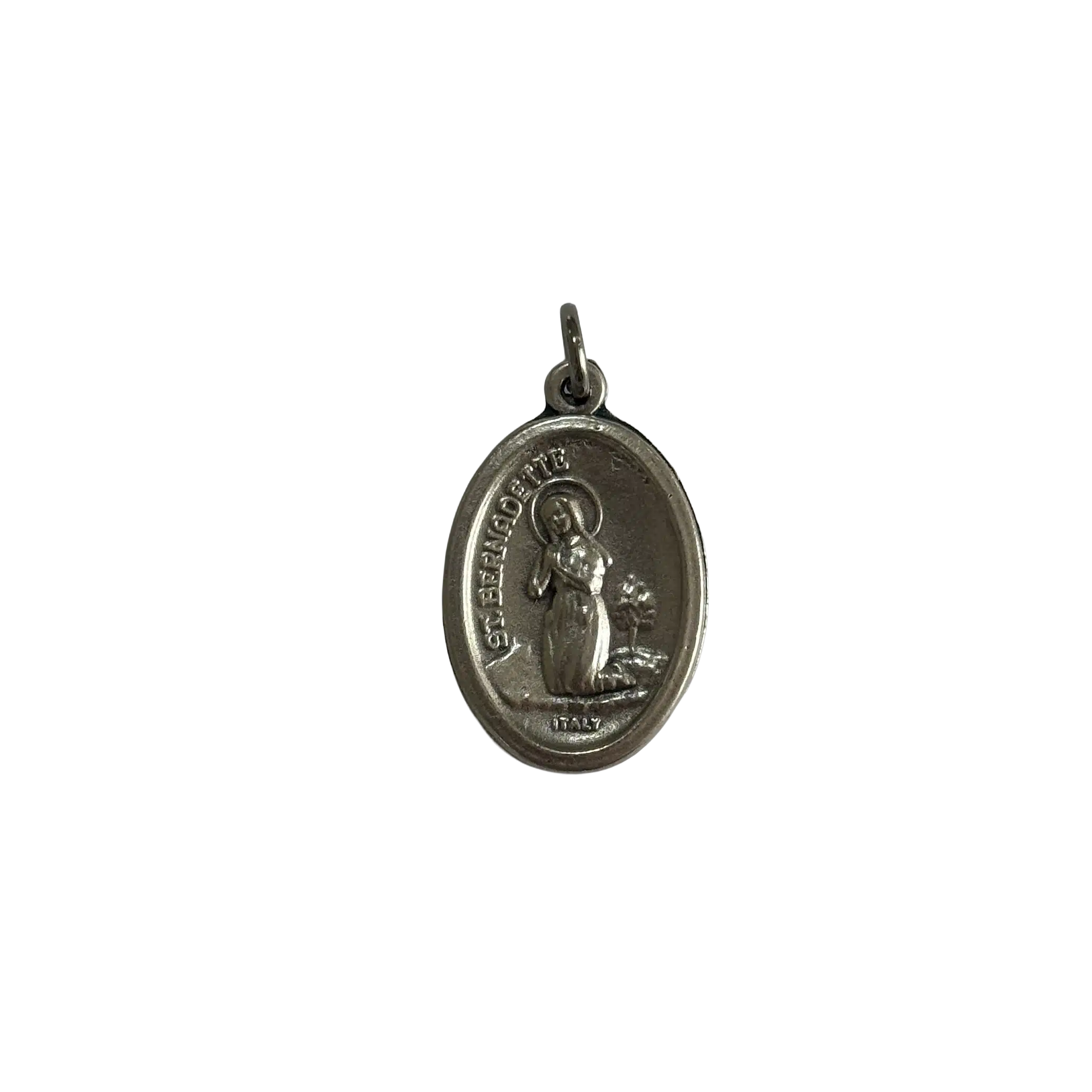 Silver St Bernadette medal showing the saint kneeling in prayer with a halo and Italy stamp.