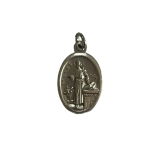 Silver St Luke medal showing the saint writing at a desk with a symbolic ox at his feet.