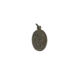 Reverse side of a silver Stella Maris medal with a block stamped Pray For Us inscription.